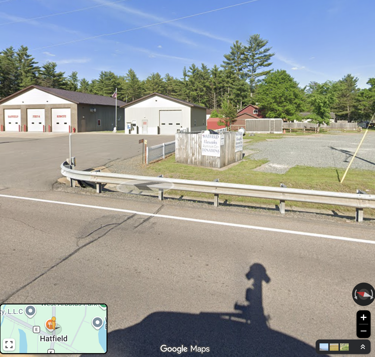 Google Street View showing the Hatfield Fireworks aluminum-can collection bin beside the fire station and County Road K.